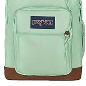 JanSport light greenish blue backpack.